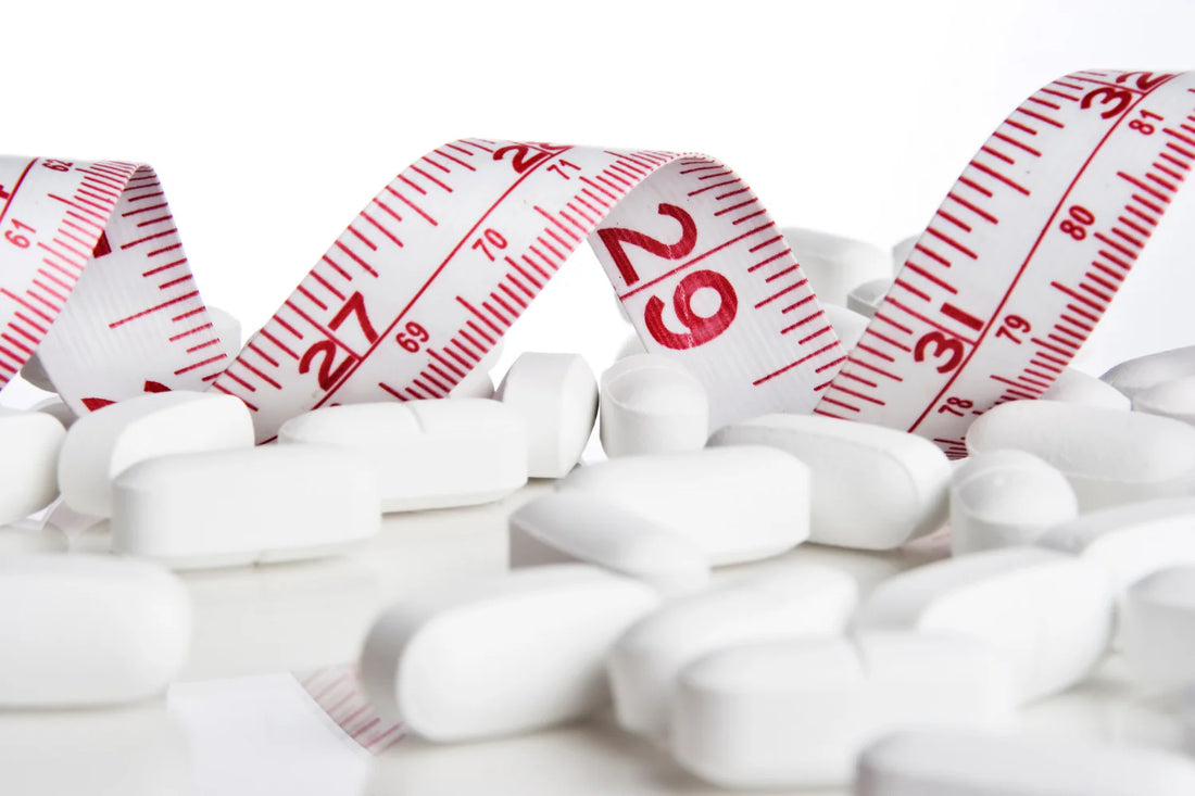 Measuring tape used for tracking weight loss behind lithium orotate supplements